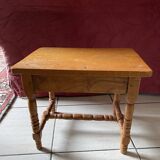 Small footrest bench in bohemian style.
