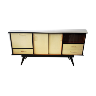 Row formica feet compass of the 1960s