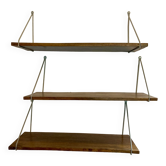 Modular wall shelves in exotic wood