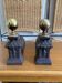 Pair of antique bedside tables in cast iron and brass.