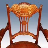 19th century armchair in leather and rosewood inlaid with brass and rosewood