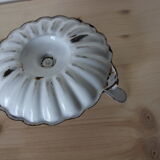 Cellar rat candle holder in enamelled sheet metal