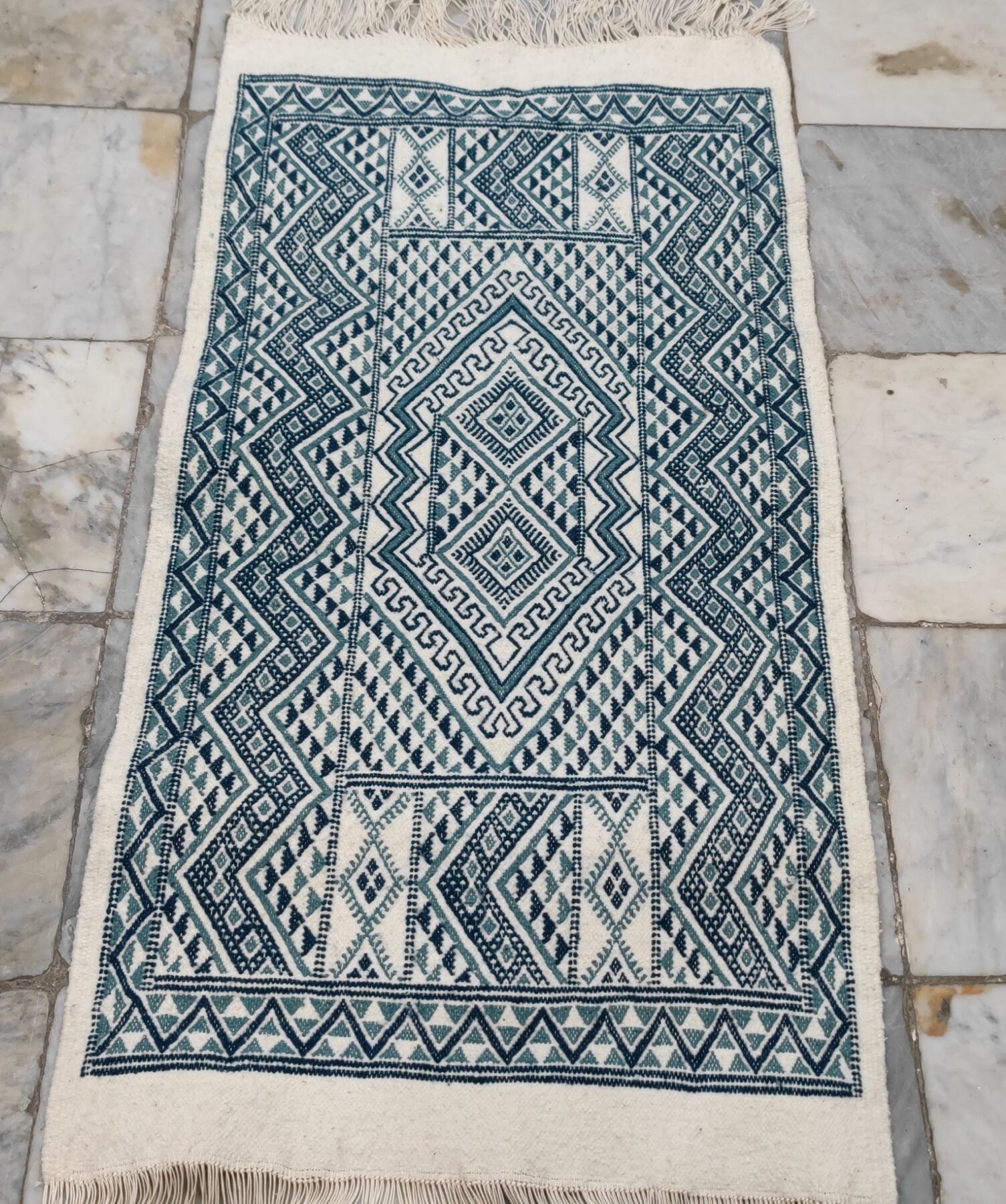 Handmade traditional white and blue carpet, 152x76 cm