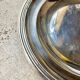 Round silver-plated metal dish