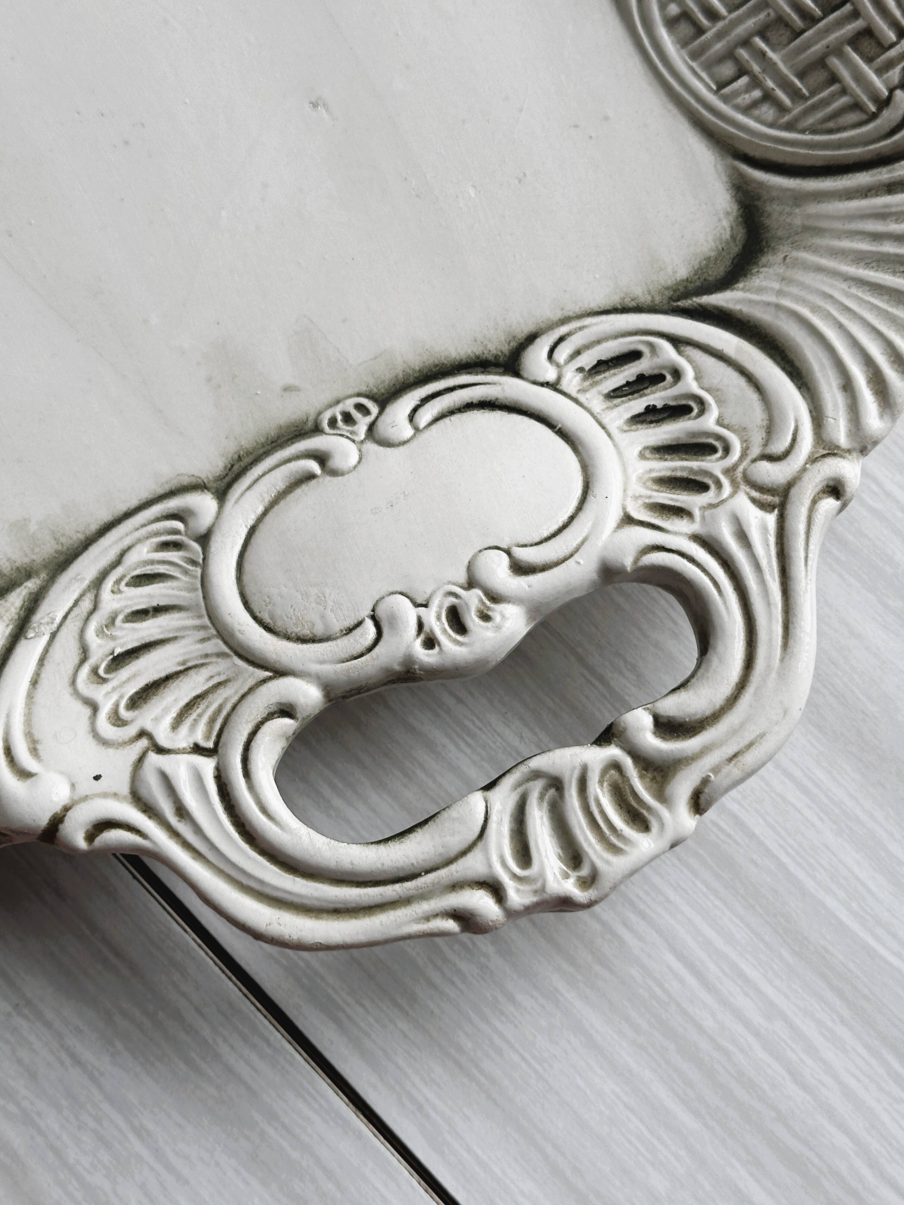 Old white ceramic tray, old dish.