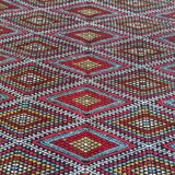 Handmade multicolored diamond patterned kilim rug in natural wool