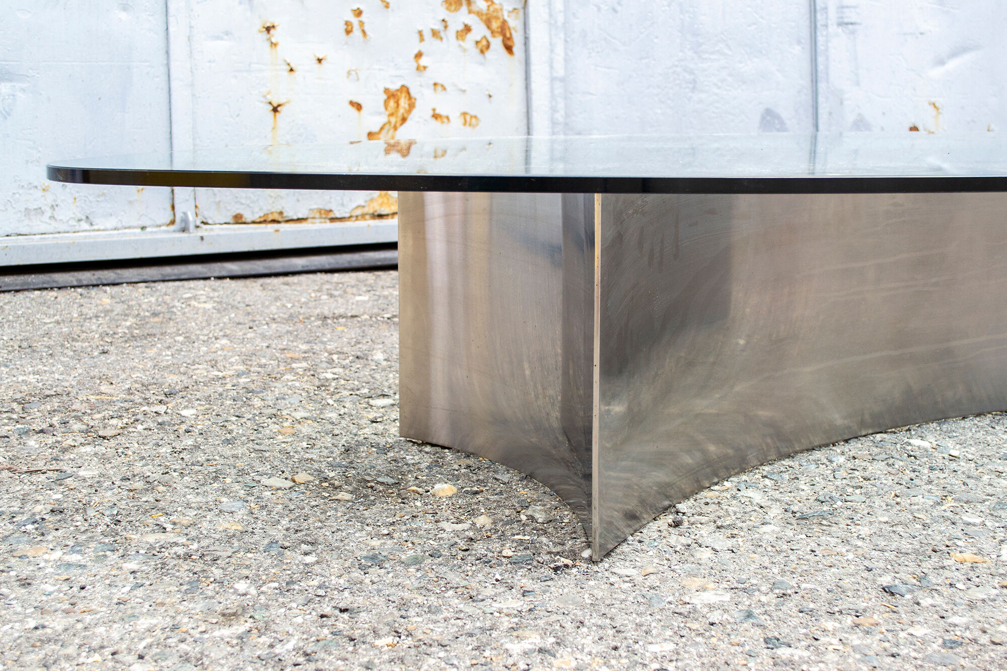 Brutalist coffee table with steel base and 70s glass top