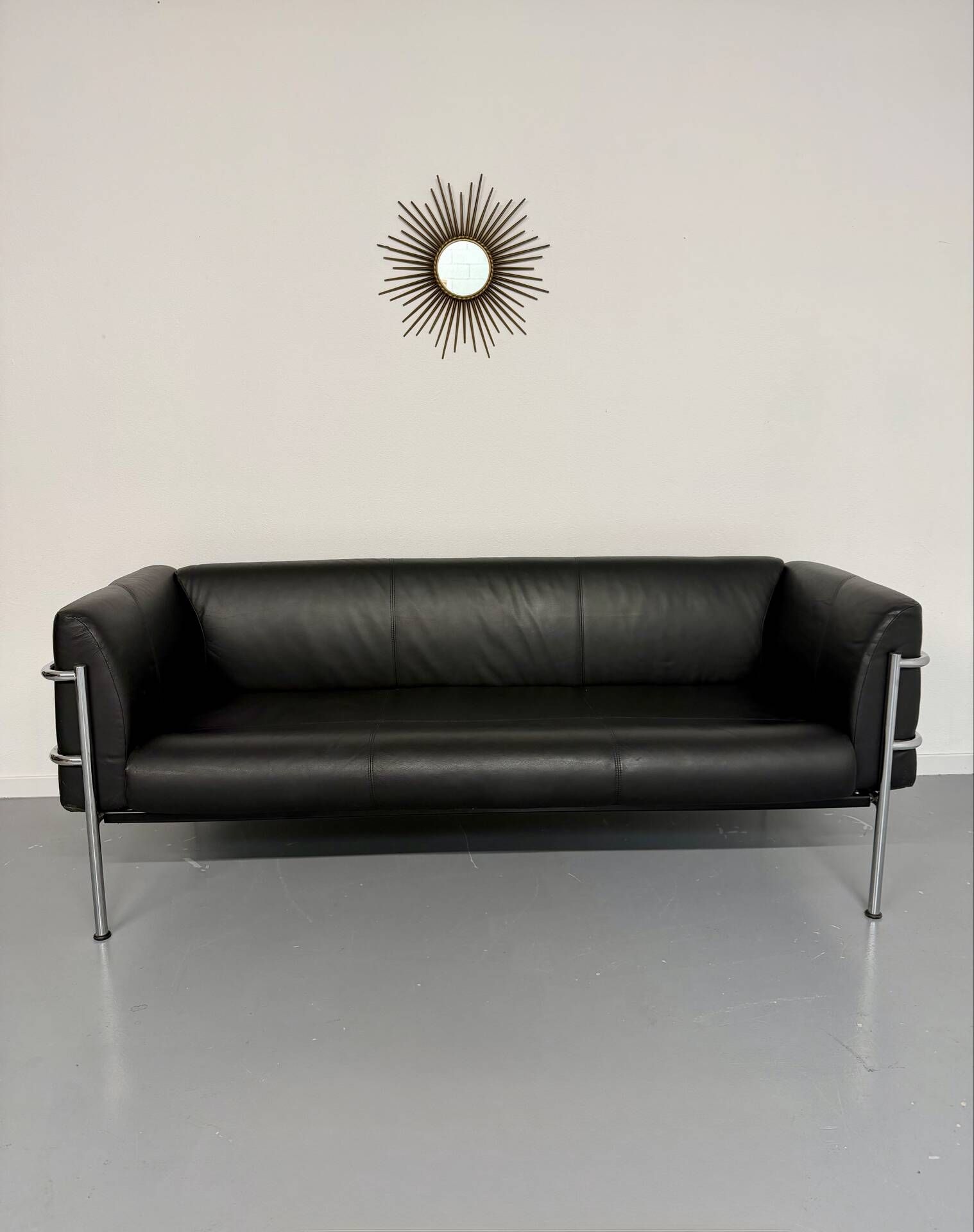 Three-seater tubular chrome and black leather sofa by Kébé, Denmark 80