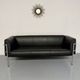 Three-seater tubular chrome and black leather sofa by Kébé, Denmark 80