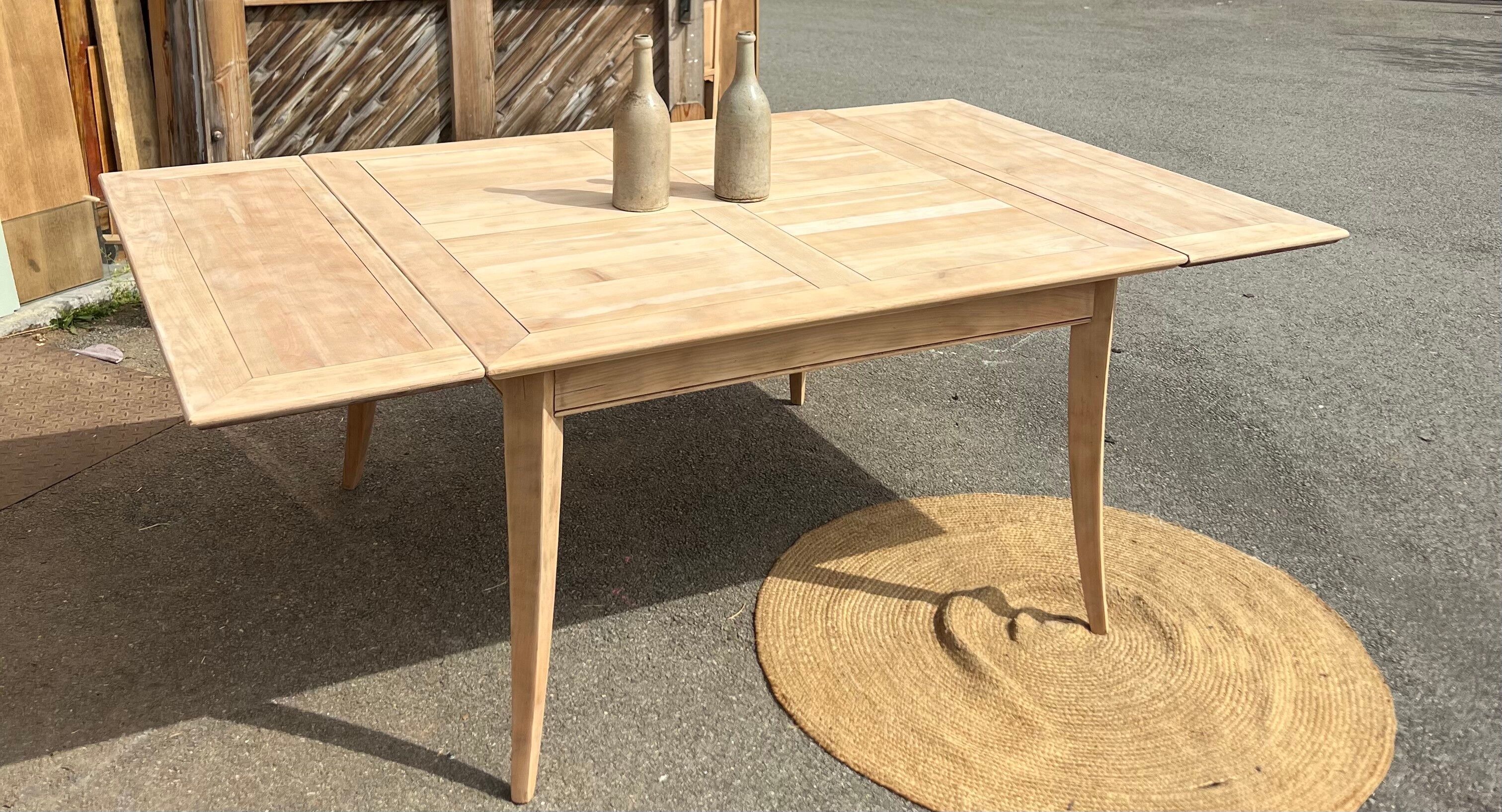 Large renovated square family table with 2 extensions in raw solid wood.