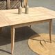 Large renovated square family table with 2 extensions in raw solid wood.