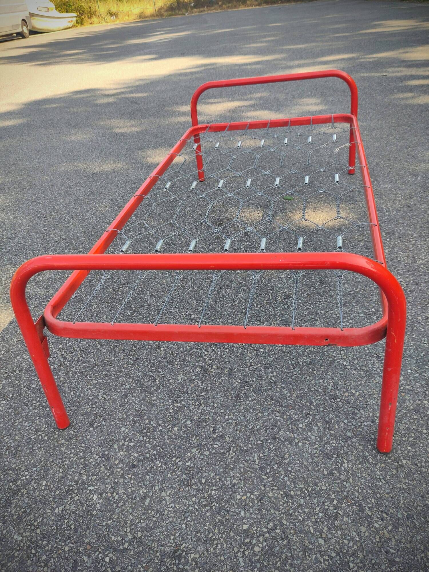 Red metal bed