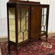 Vitrine Anglaise Chippendale 3 portes début XXème en acajou