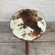 Old wooden tripod stool with seat leather vintage