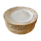 Set of 9 dessert plates in white and gold porcelain