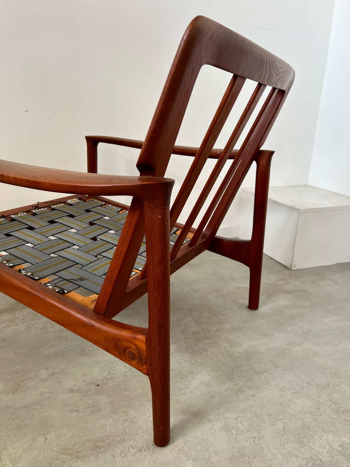Old Scandinavian design armchair in vintage teak year 60