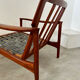 Old Scandinavian design armchair in vintage teak year 60