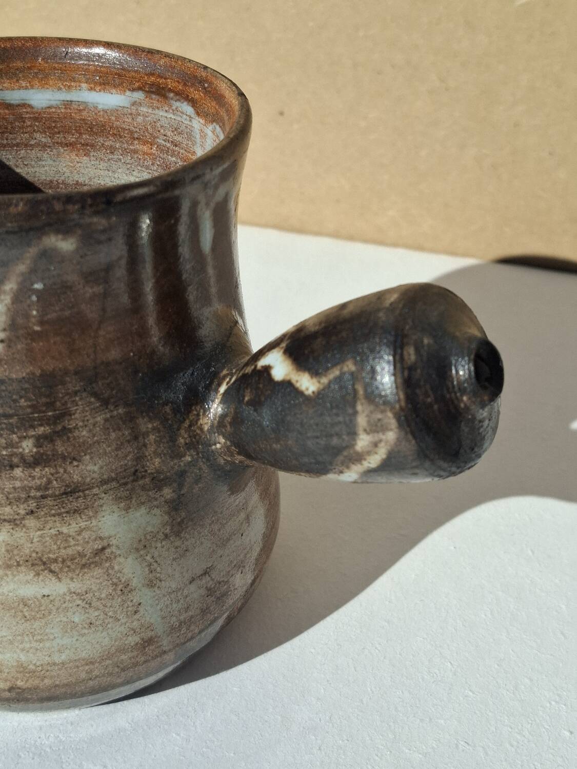 Stoneware pitcher signed by Jacques Pouchain.