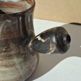 Stoneware pitcher signed by Jacques Pouchain.