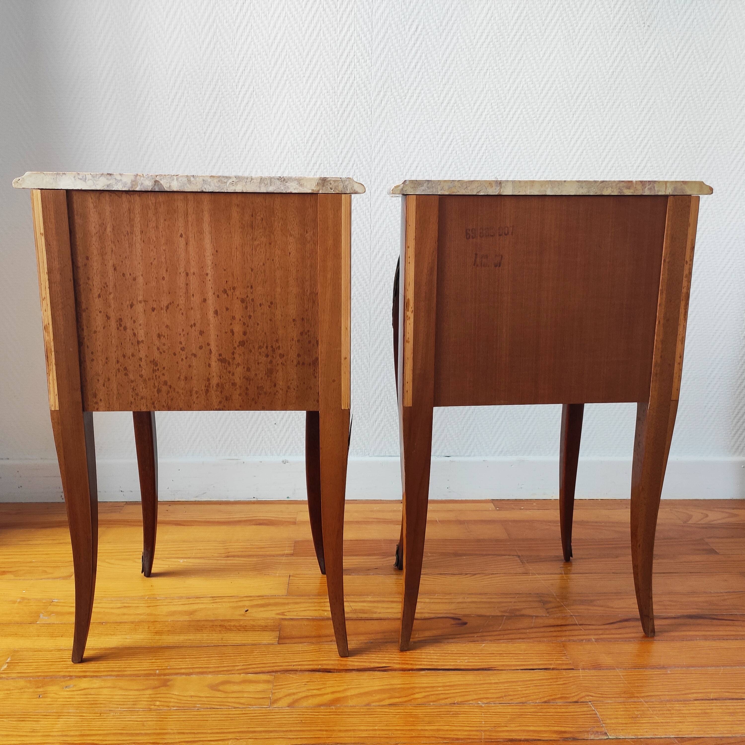 Pair of French Louis XV style bedside tables.