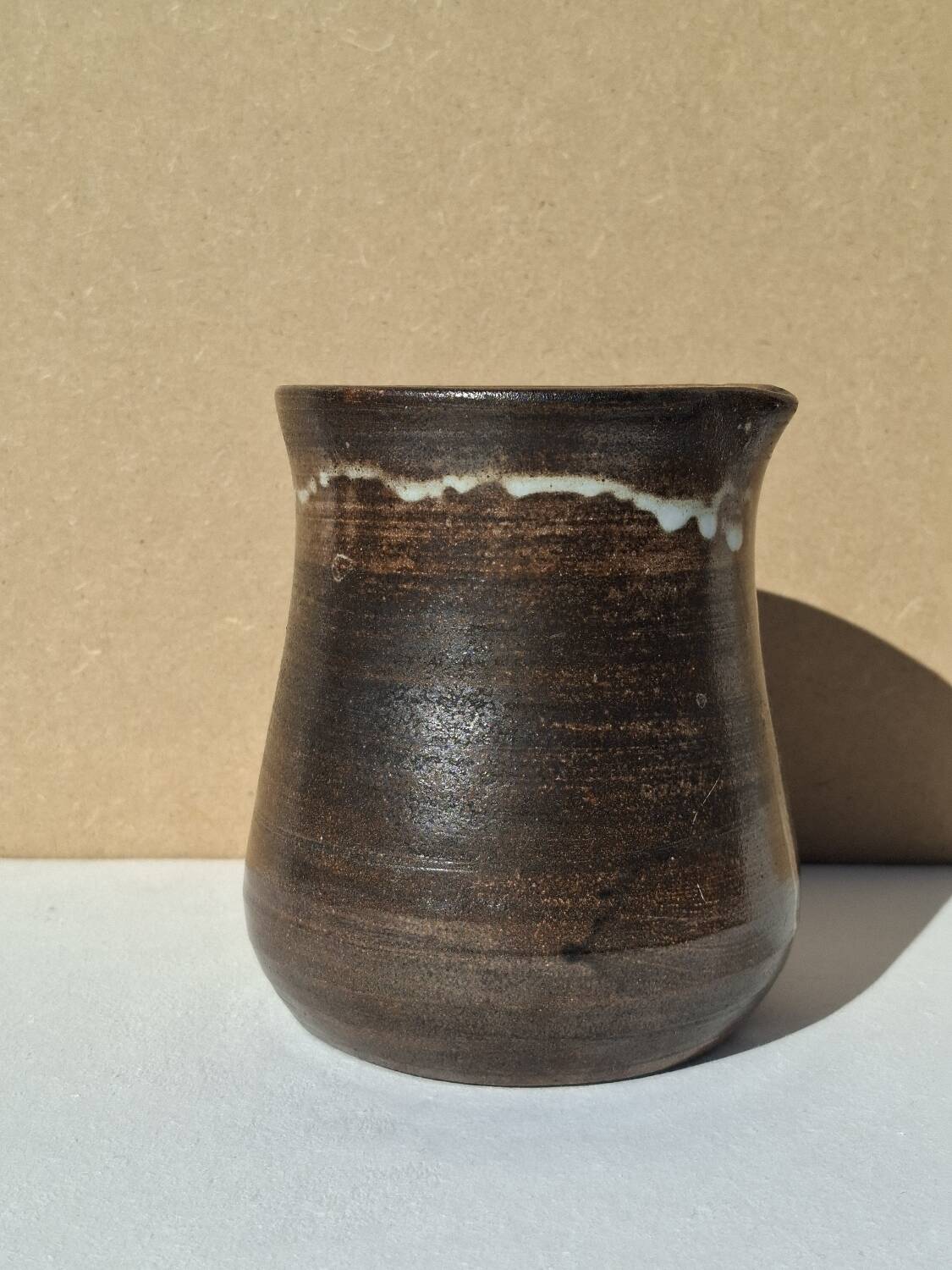 Stoneware pitcher signed by Jacques Pouchain.