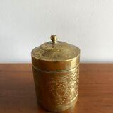 Old round box in chiseled brass
