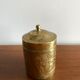 Old round box in chiseled brass