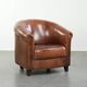 Vintage sheepskin club armchair in English style with deep colours
