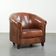 Vintage sheepskin club armchair in English style with deep colours