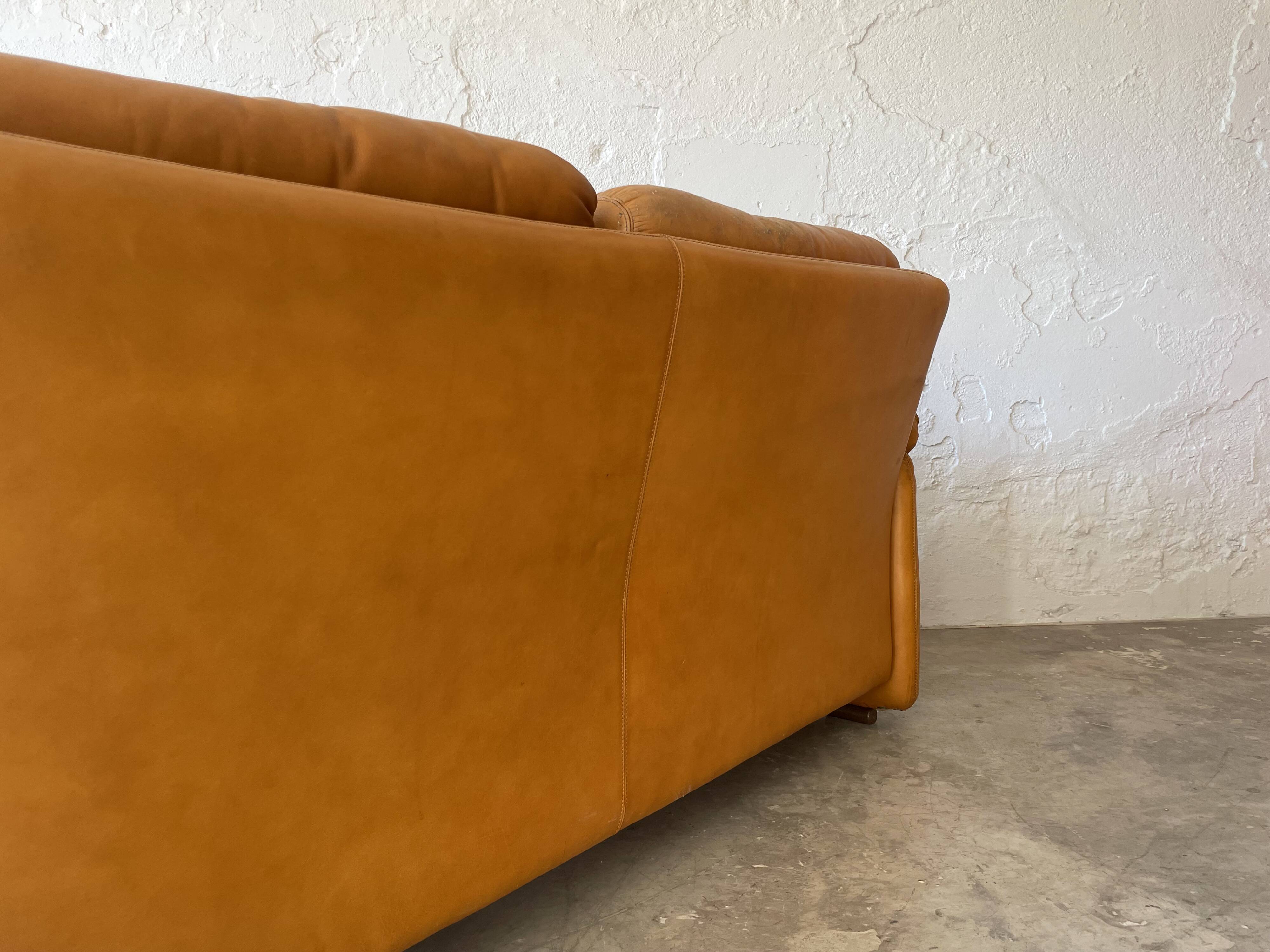 Two seats leather sofa, by Tobias Scarpa