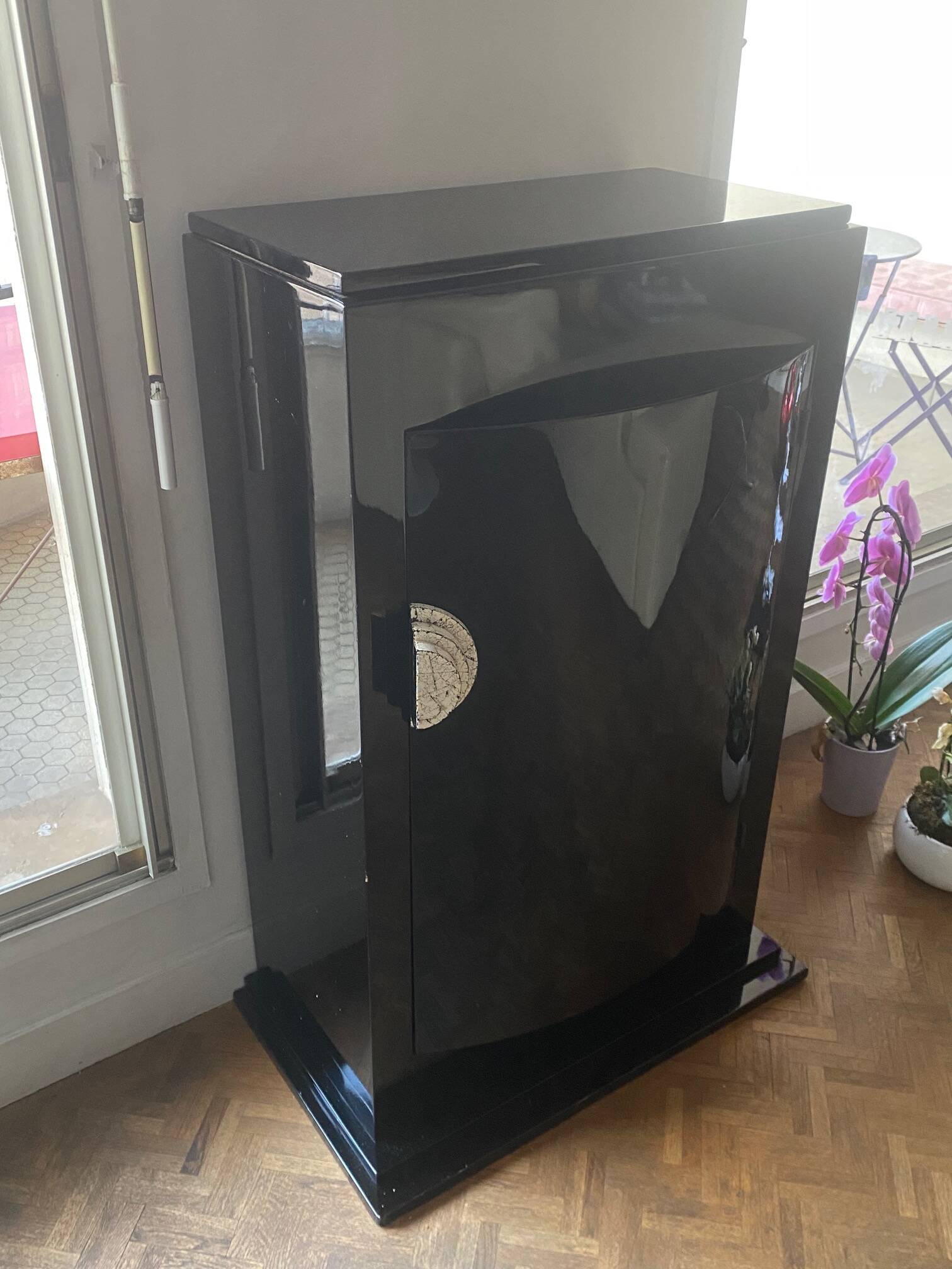 Curved black lacquered furniture signed assouline and dated 1987.