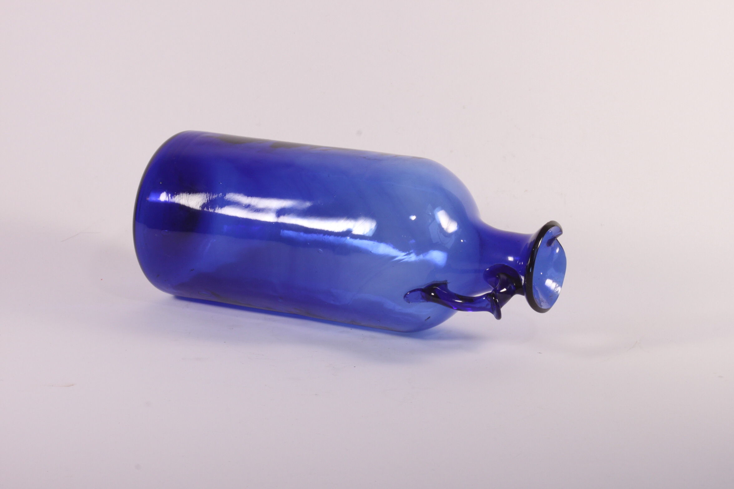Antique handblown cobalt blue pitcher bottle, ca 1900.