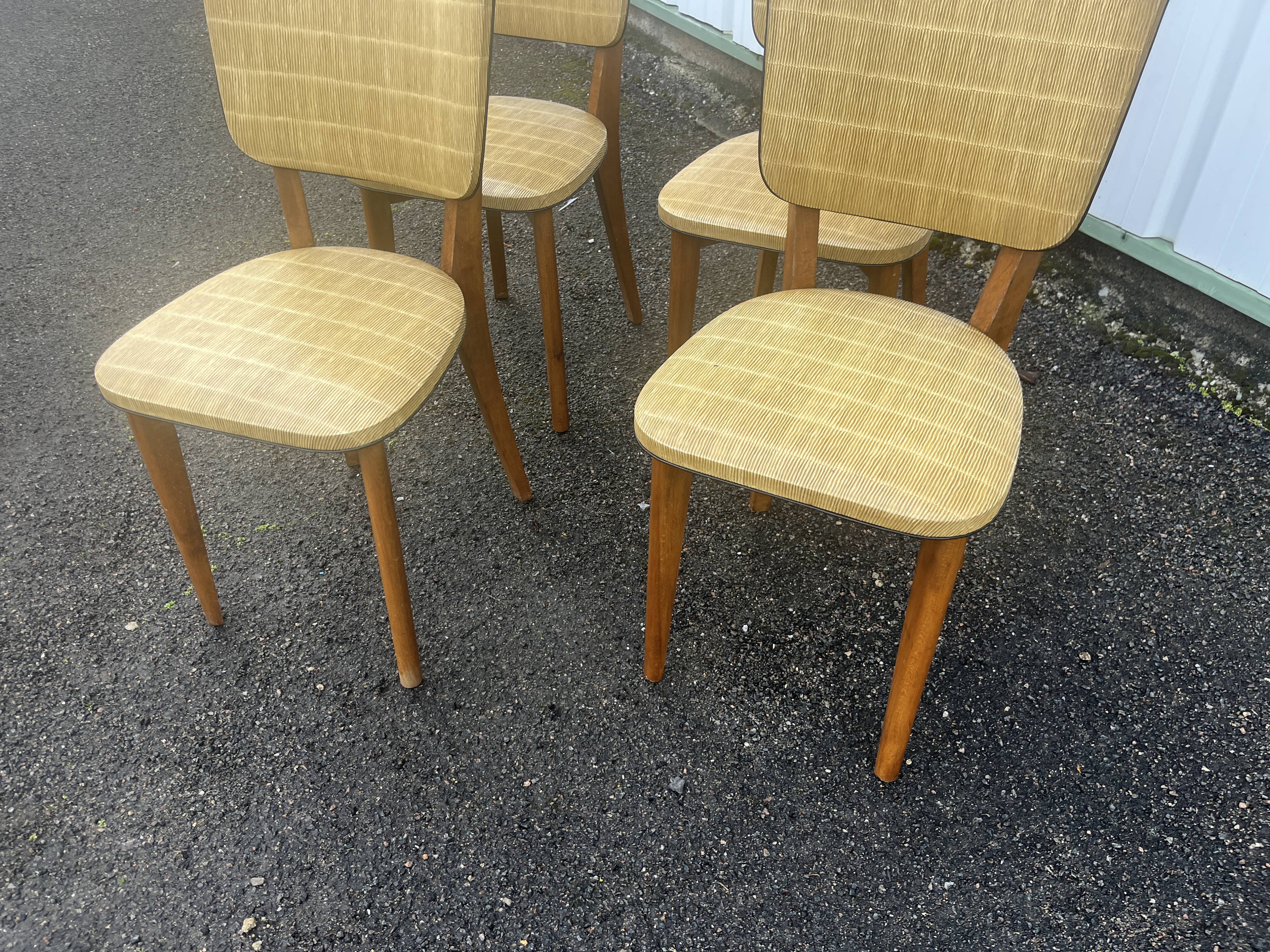 Set of 4 vintage chairs from the 50s and 60s in Scandinavian style.