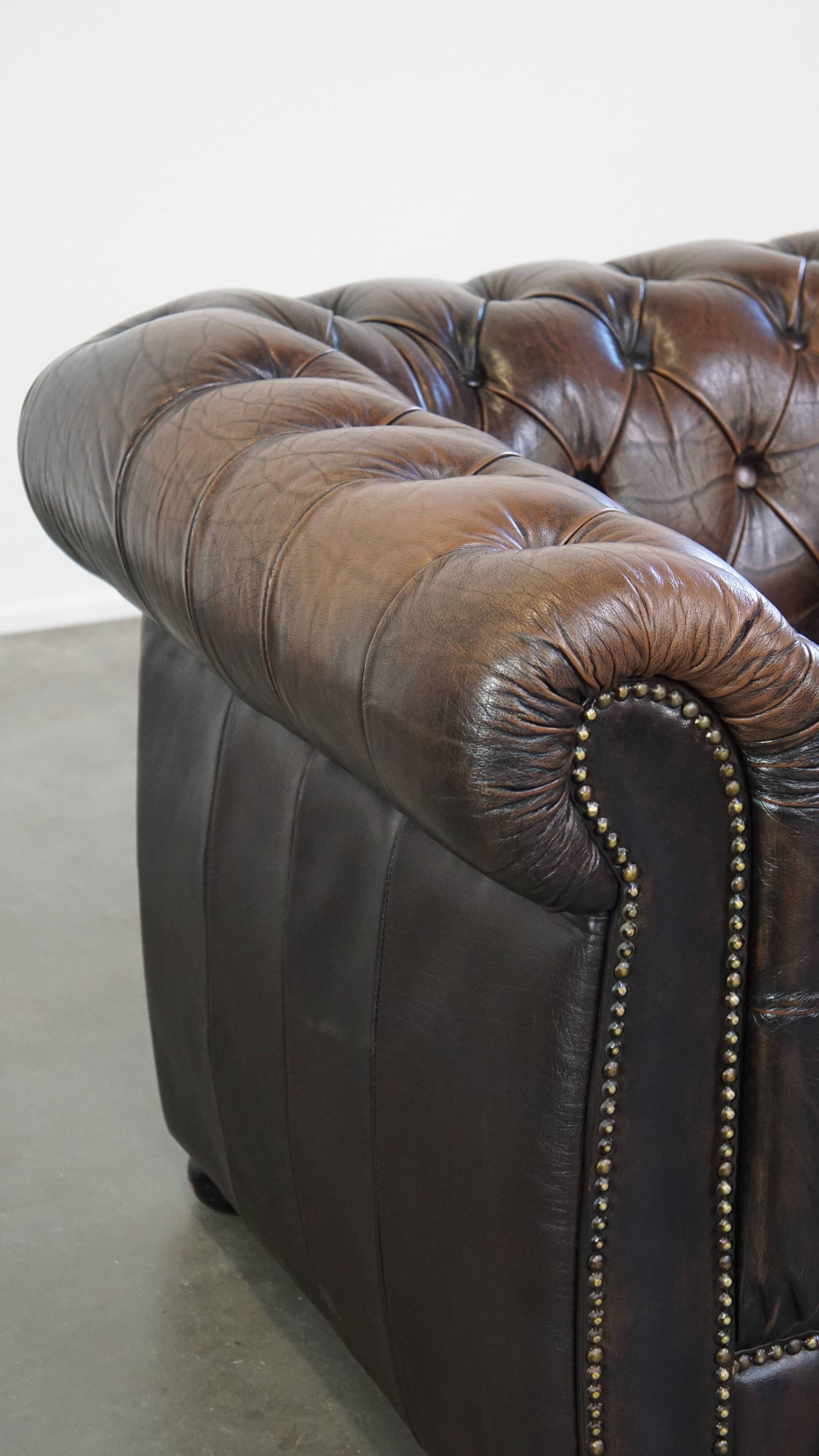 English Chesterfield armchair in sheepskin
