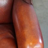 Large comfortable sheepleather wingchair in good condition and beautiful colours