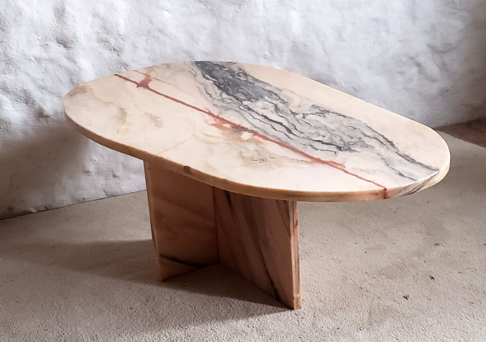Veined pink marble coffee table