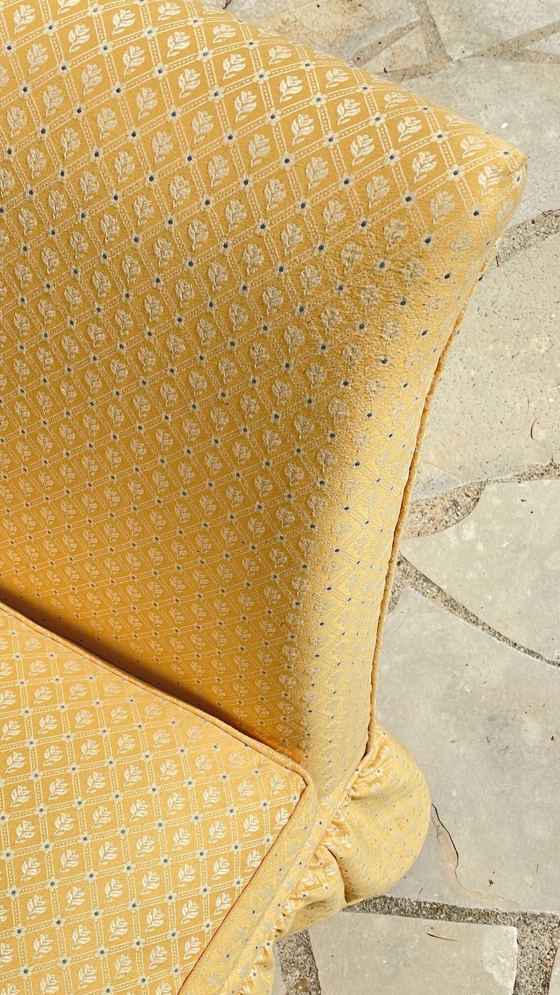 Vintage upholstered fabric toad armchair