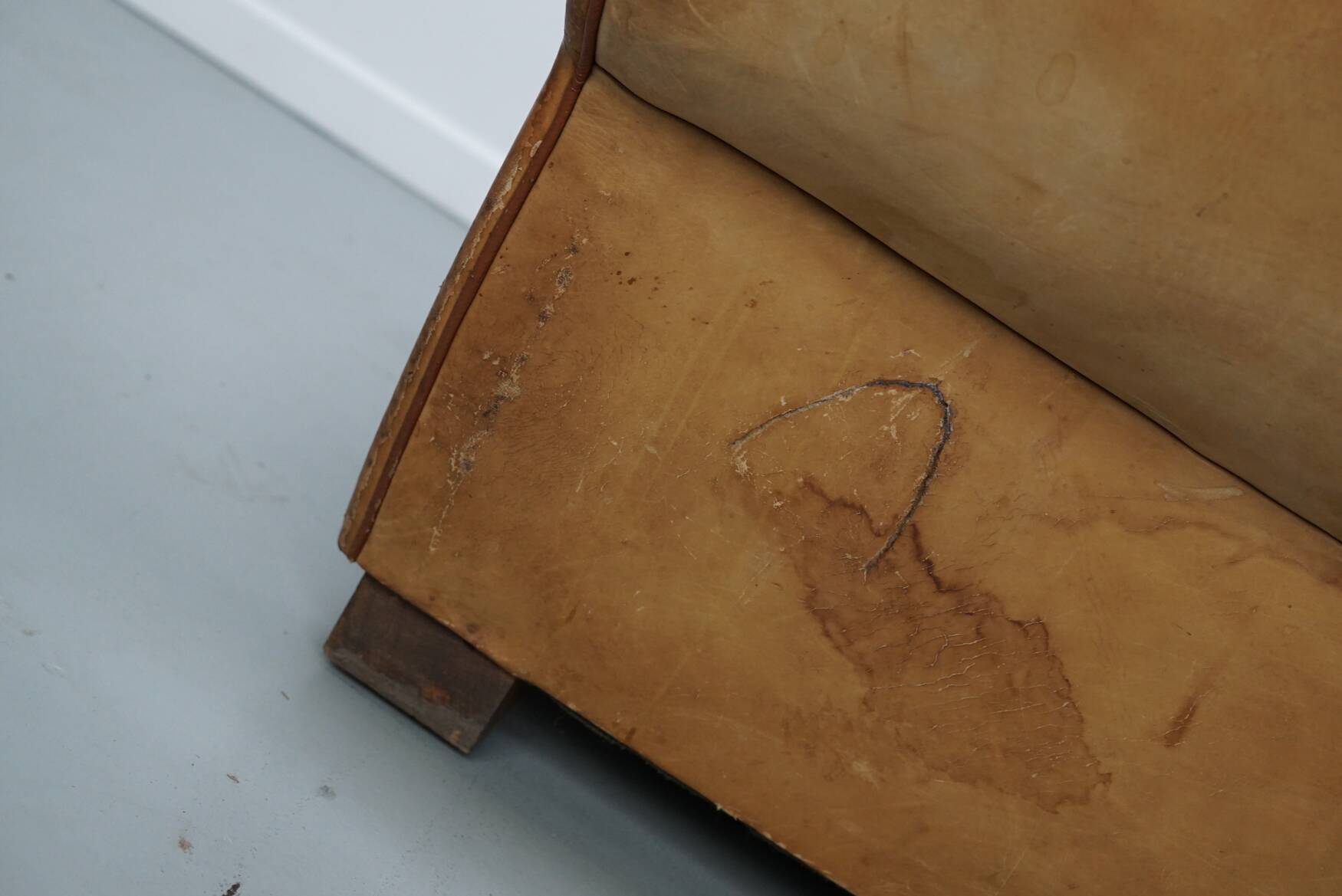 Pair of French club chairs with moustache back in cognac leather, 1940s