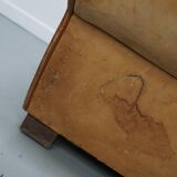 Pair of French club chairs with moustache back in cognac leather, 1940s