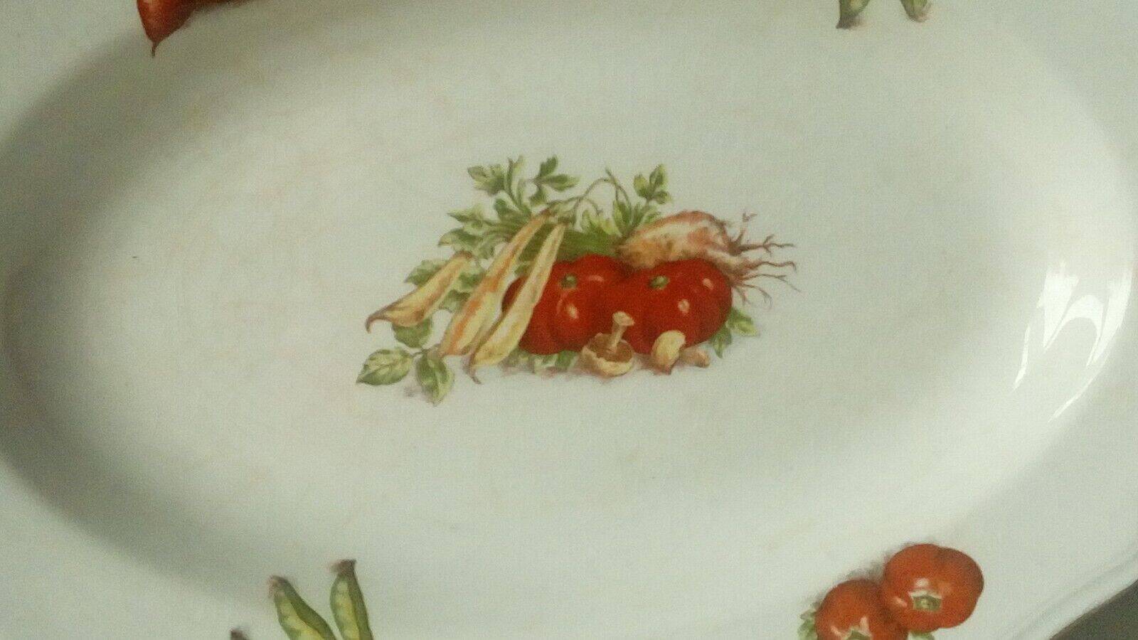 Hollow and oval earthenware dish with 4 seasons vegetable decoration