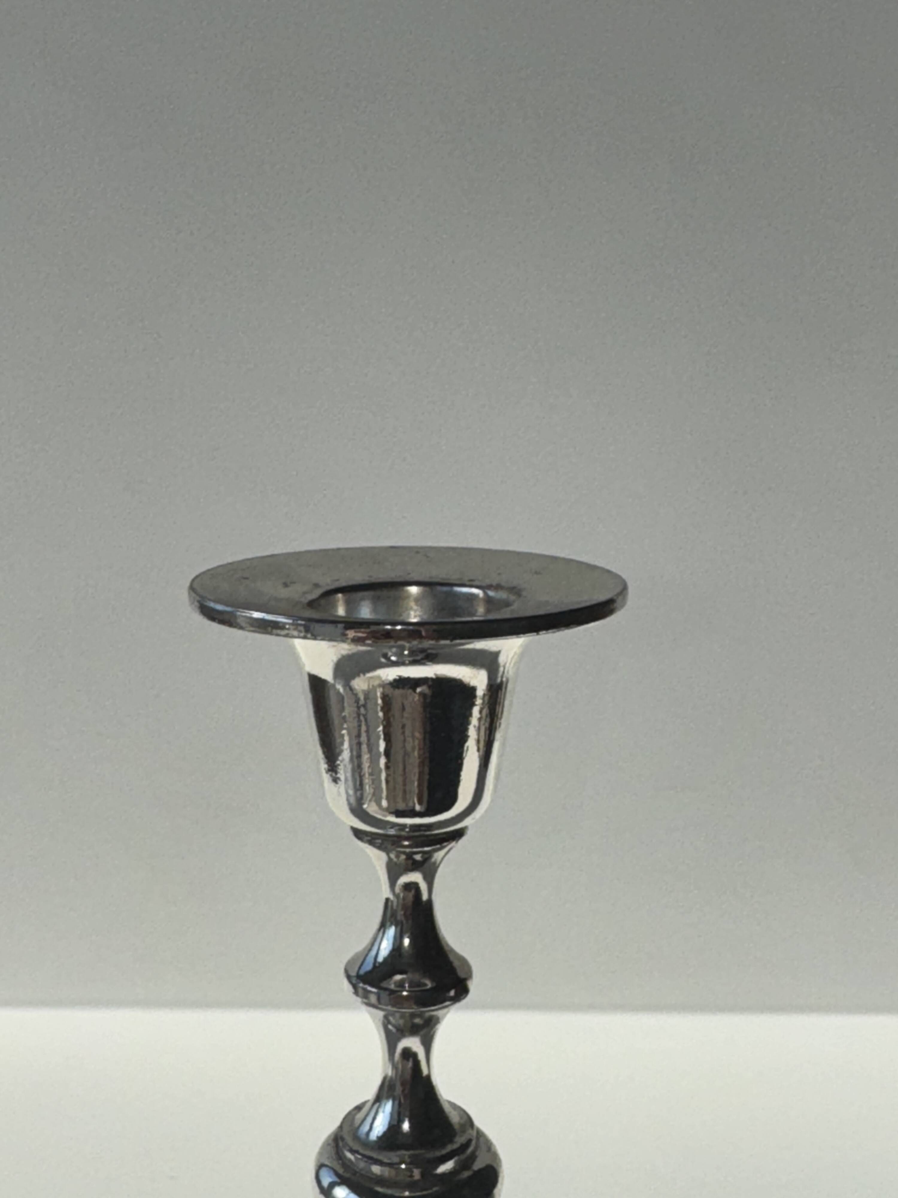Pair of small silver candlesticks