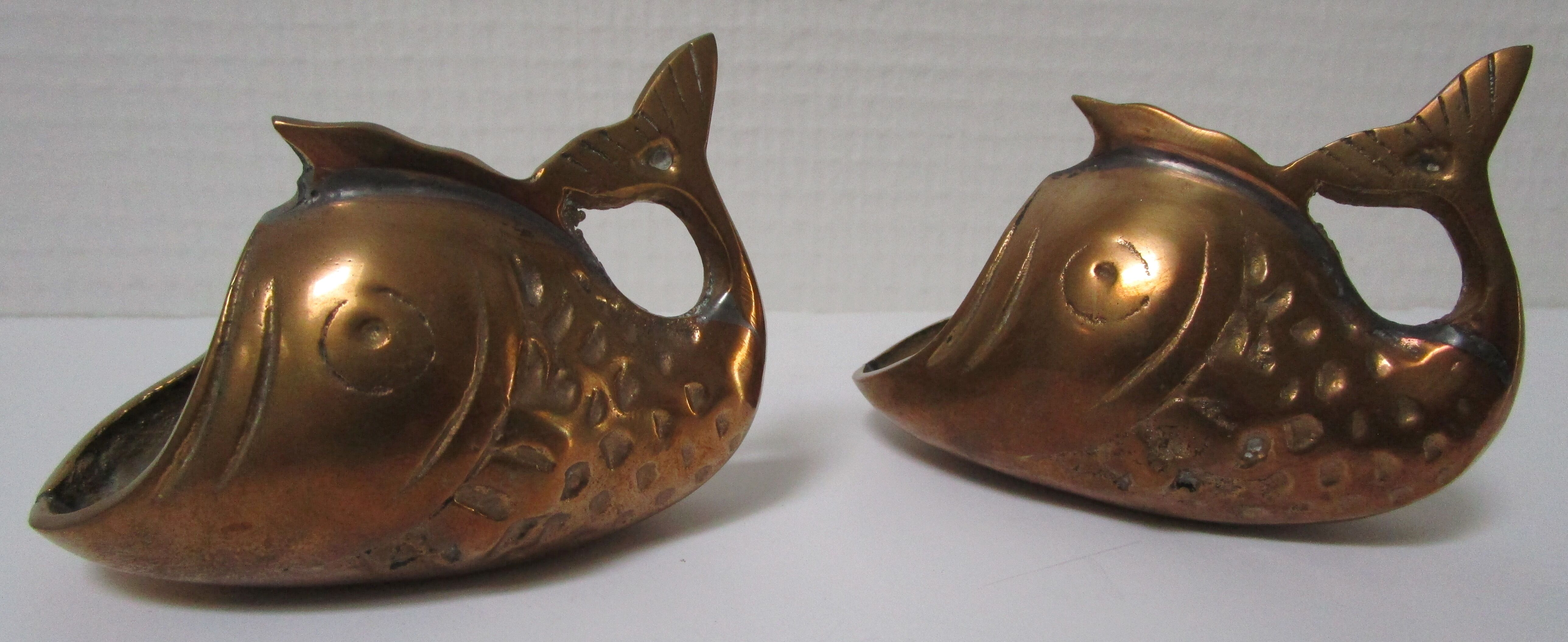 Two vintage brass fish ashtrays