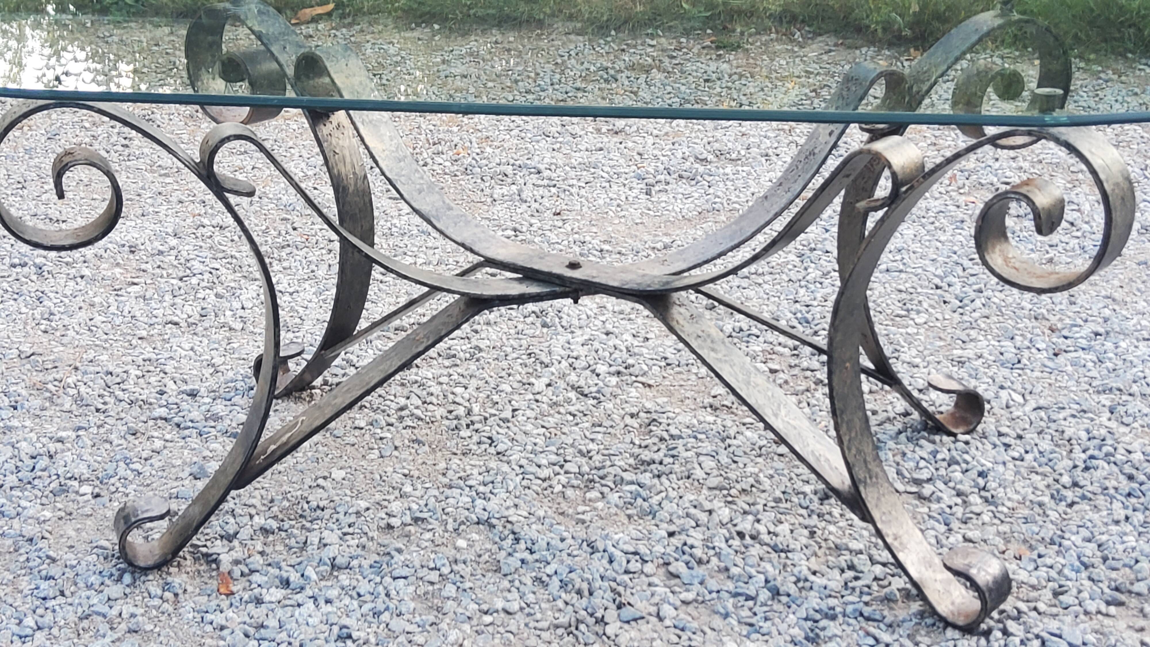 Coffee table from the 70s in wrought iron glass top bec de corbin