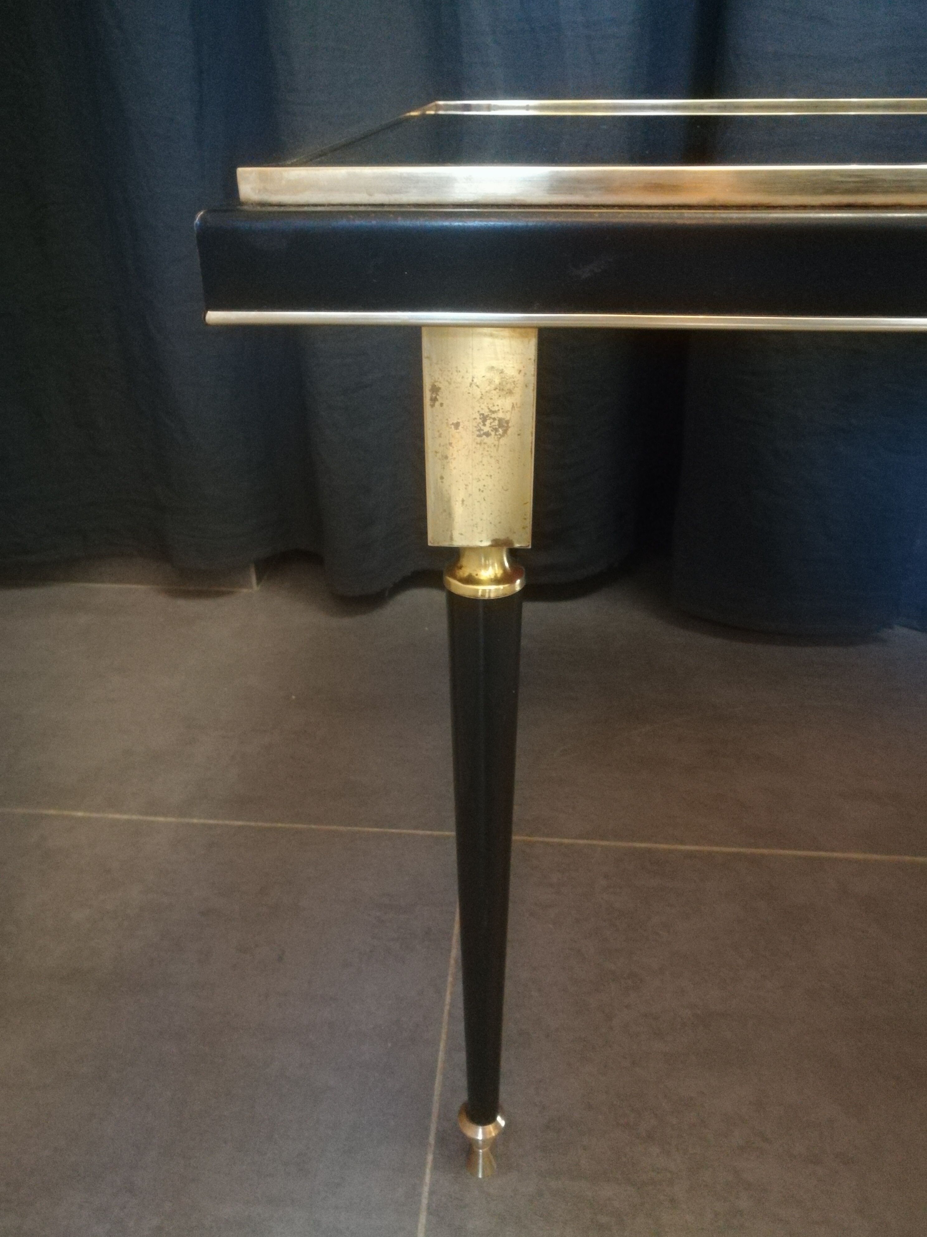 Coffee table in brass and black lacquered metal
