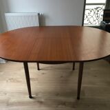 Extended round table in teak 60s