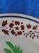 Opaque porcelain plate of Sarreguemines pattern vase of flowers diam 22 cm