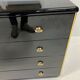 Black lacquered chest of drawers