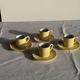 Set of 4 vintage yellow Italian espresso cups and saucers.
