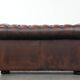 Dark brown cow leather vintage 2-seater Chesterfield sofa in English style