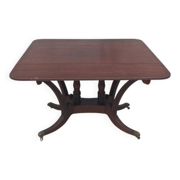 19th-century English style mahogany drop-leaf table.